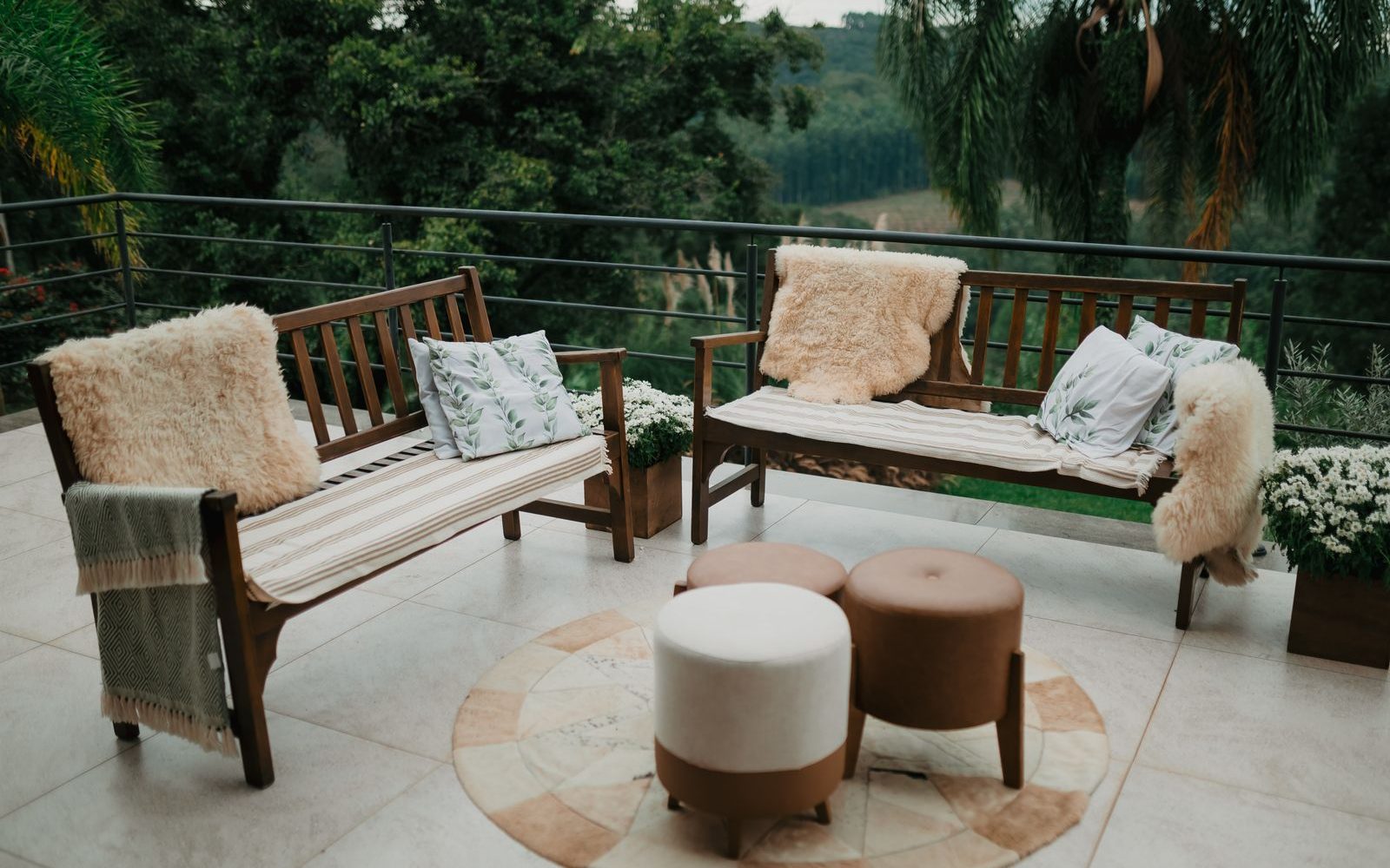 Backyard patio with wooden furniture